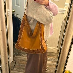 Hobo leather tote with crochet sides